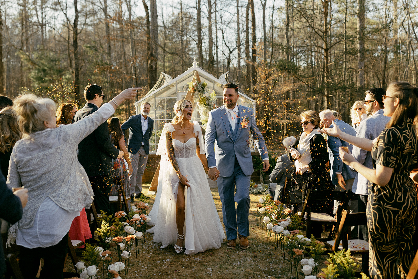 Backyard garden party wedding with florals being thrown