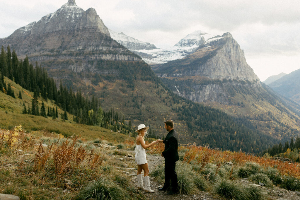 Stunning Fall elopement in Glacier National Park, surrounded by golden fall foliage.