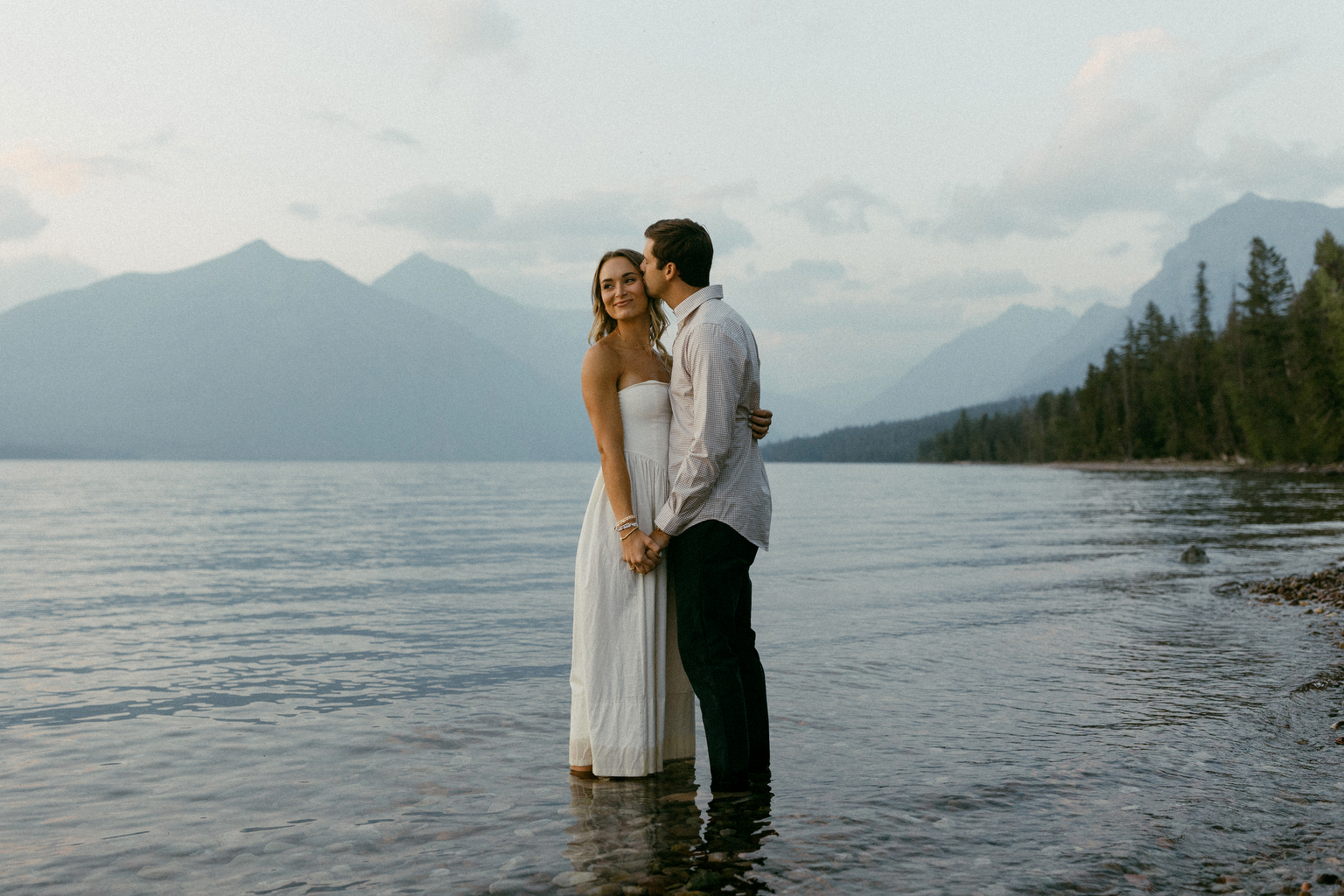 Couple explore Lake McDonald together and even take a dip into the lake