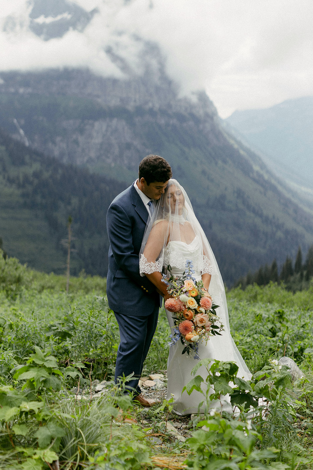 bride and groom at big bend in glacier national park for their wedding